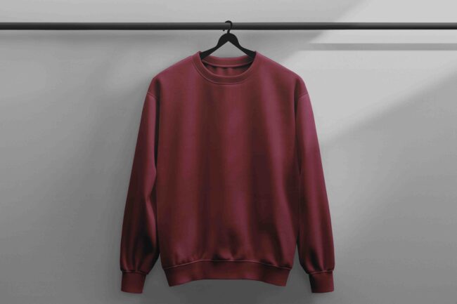 Trendy maroon sweatshirt offering warmth and style with a comfortable fit.